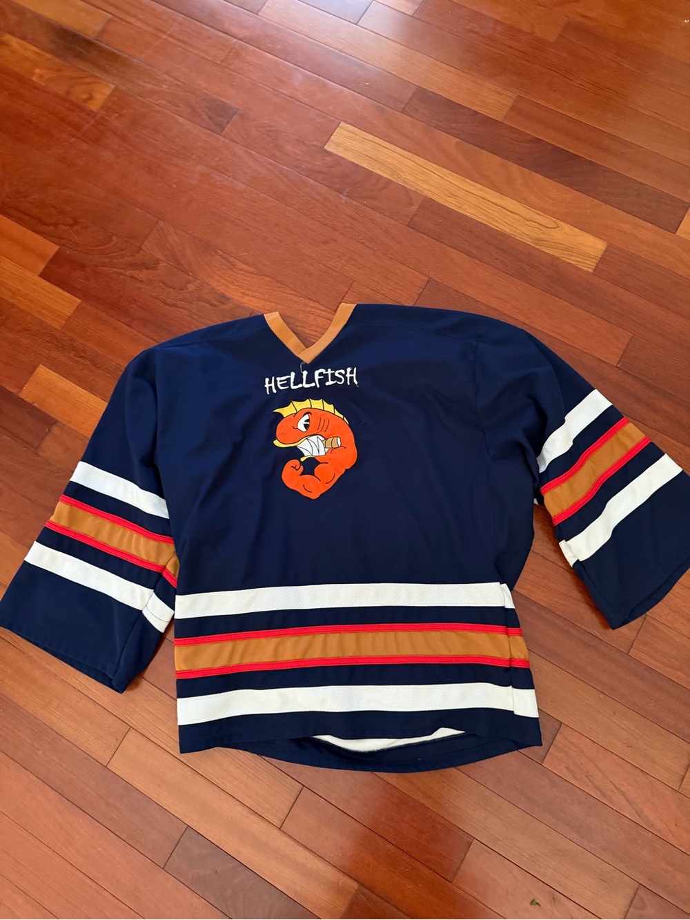 The Simpsons Men's Navy 'Hellfish' Striped Hockey Jersey with Mascot Graphic